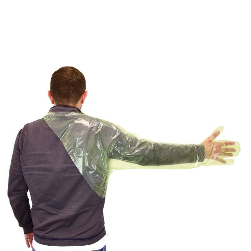 Man wearing disposable green veterinary shoulder glove covering full arm