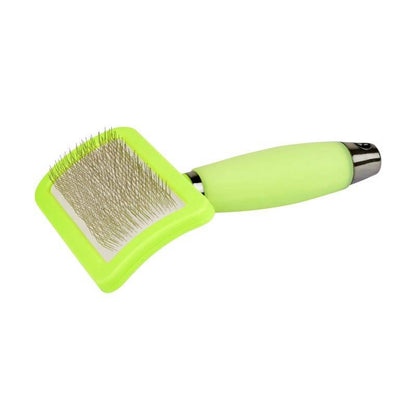 Green silicone pet grooming brush with fine metal bristles for coat care