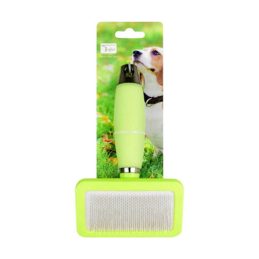 Green silicone pet grooming brush with metal bristles, shown in retail packaging